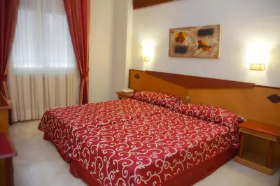 Cama o camas de una habitación en Hotel Del Val