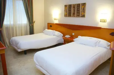 Cama o camas de una habitación en Hotel Del Val