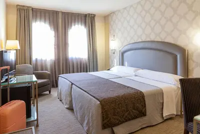 Cama o camas de una habitación en Hotel Macià Alfaros