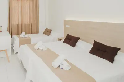 Cama o camas de una habitación en Hotel Olive