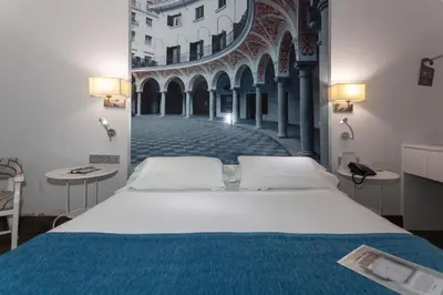 Cama o camas de una habitación en AACR Hotel Monteolivos