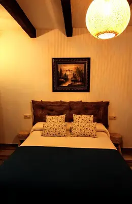 Cama o camas de una habitación en Casa rural El Nido de Despeñaperros