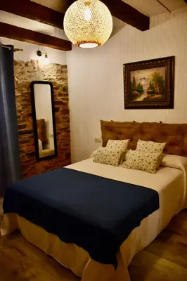 Cama o camas de una habitación en Casa rural El Nido de Despeñaperros
