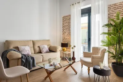 Zona de estar de One&lux Puerta Osario