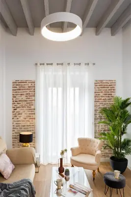 Zona de estar de One&lux Puerta Osario