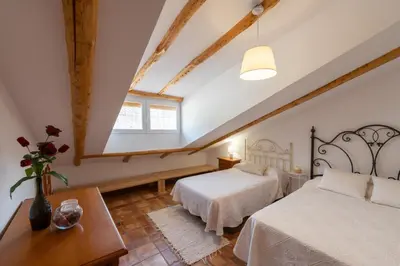 Cama o camas de una habitación en Vivienda Rural Las Bartolas