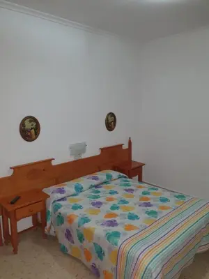 Cama o camas de una habitación en Pensión los Ángeles