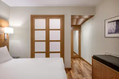 Cama o camas de una habitación en AC Hotel Sevilla Fórum by Marriott