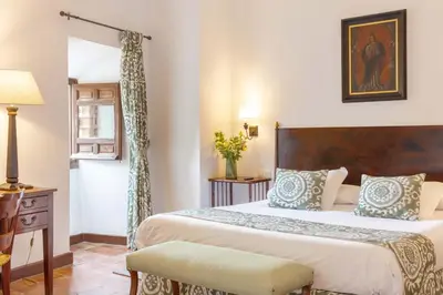 Cama o camas de una habitación en Hotel Puerta de la Luna