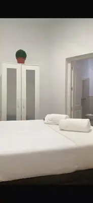 Cama o camas de una habitación en PLENO CENTRO DE SEVILLA- JUNTO IGLESIA MONTESIÓN