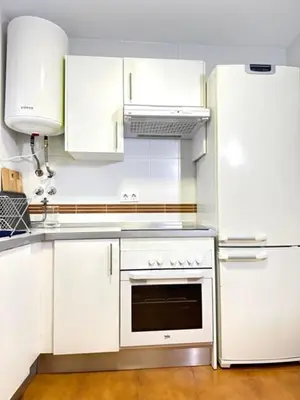 Una cocina o zona de cocina en Apartamento Puerta Cerrada