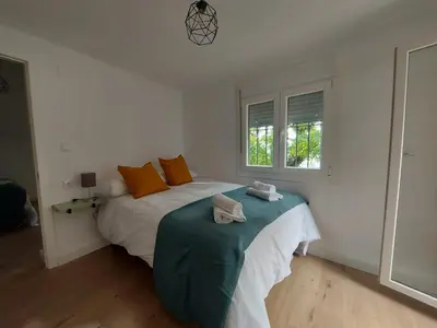 Cama o camas de una habitación en Casa del Arco