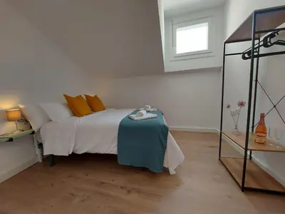Cama o camas de una habitación en Casa del Arco