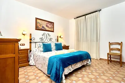 Cama o camas de una habitación en Alojamiento La Nave de Zuheros