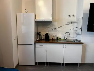 Una cocina o zona de cocina en Loft familiar 