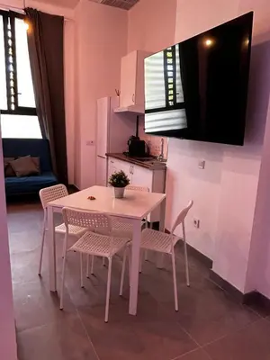 Una televisión o centro de entretenimiento en Loft familiar 