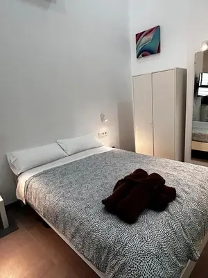 Cama o camas de una habitación en Loft familiar 
