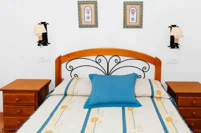 Cama o camas de una habitación en La Atalaya