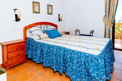 Cama o camas de una habitación en La Atalaya