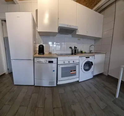 Una cocina o zona de cocina en #1# Estudio Sevilla centro BAÑERA HIDROMASAJE