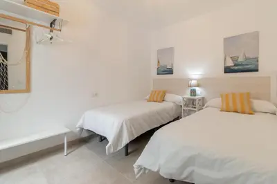 Cama o camas de una habitación en Precioso apartamento junto al Palacio de Orive