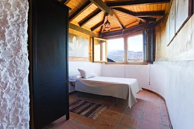 Cama o camas de una habitación en Villa El Lagar Rocabella