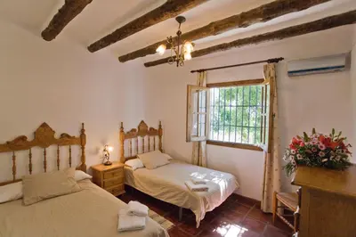 Cama o camas de una habitación en Villa La Manzanilla Rocabella