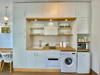 Una cocina o zona de cocina en LOFT DELUXE ALMA GARDEN