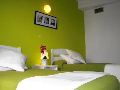 Cama o camas de una habitación en Hostal Santa Catalina