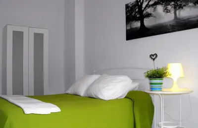 Cama o camas de una habitación en Hostal Santa Catalina