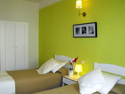 Cama o camas de una habitación en Hostal Santa Catalina