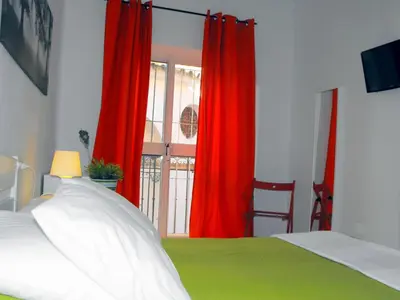 Cama o camas de una habitación en Hostal Santa Catalina