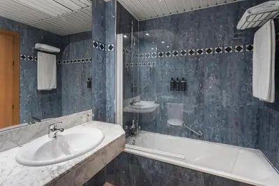 Un baño de Exe Sevilla Macarena