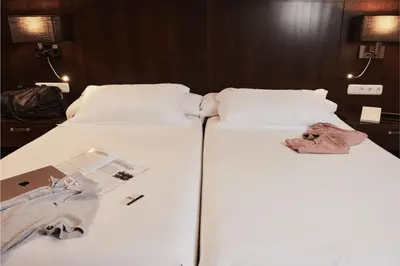 Cama o camas de una habitación en HO By Olivencia Ciudad de Jaén