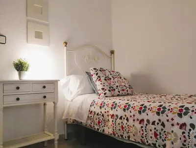 Cama o camas de una habitación en Sueños de Córdoba