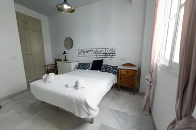 Cama o camas de una habitación en Virgen Carmen Dolorosa Plaza de la Alameda