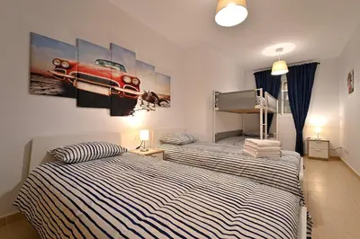 Cama o camas de una habitación en Alojamiento Alcantara
