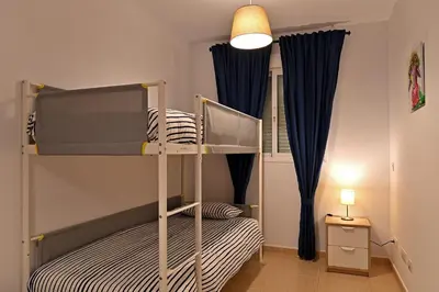 Cama o camas de una habitación en Alojamiento Alcantara