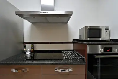 Una cocina o zona de cocina en Alojamiento Alcantara