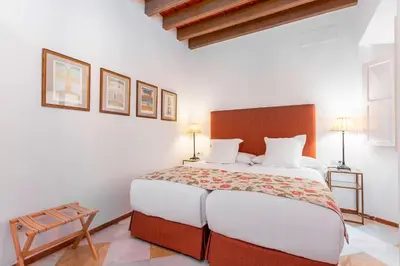 Cama o camas de una habitación en Genteel Home Campamento