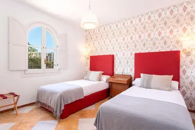 Cama o camas de una habitación en Genteel Home Campamento