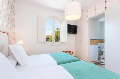 Cama o camas de una habitación en Genteel Home Campamento