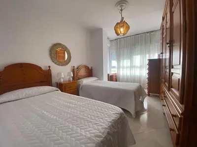 Cama o camas de una habitación en funcional piso 4 dormitorios frente a santa justa