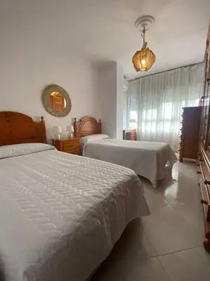 Cama o camas de una habitación en funcional piso 4 dormitorios frente a santa justa