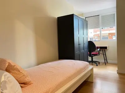 Cama o camas de una habitación en Hispalis Nervión