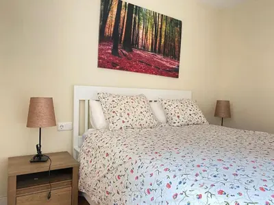 Cama o camas de una habitación en Hispalis Nervión