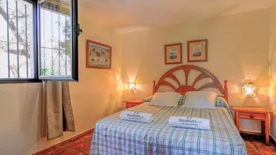 Cama o camas de una habitación en Casa Madrona Periana by Ruralidays