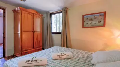 Cama o camas de una habitación en Casa Madrona Periana by Ruralidays