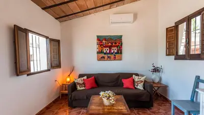 Zona de estar de La Casita del Sabinal Álora by Ruralidays
