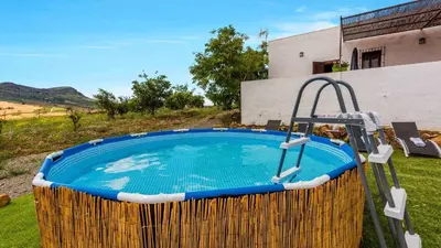 Piscina en o cerca de La Casita del Sabinal Álora by Ruralidays